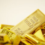 Gold Bars On White Background.