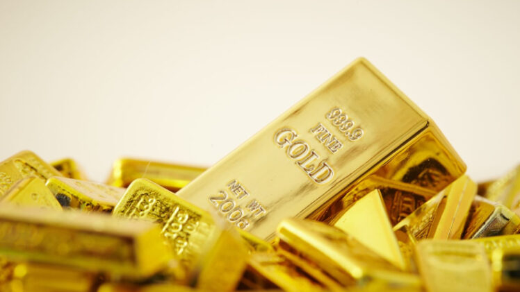 Gold Bars On White Background.